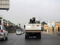 Cairo, Egypt, April 8 2023: Maintenance lift truck with a lifting mechanical equipped crane with a cable for lifting heavy objects