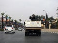 Cairo, Egypt, April 8 2023: Maintenance lift truck with a lifting mechanical equipped crane with a cable for lifting heavy objects