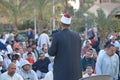 A mosque preacher Imam performs Eid Al Fetr Khutbah (sermon) in an open air space near the mosque,