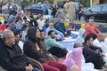 A mosque preacher Imam performs Eid Al Fetr Khutbah (sermon) in an open air space near the mosque,