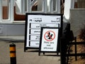 Cairo, Egypt, April 24 2023: A no pets allowed sign to address property policy and safety concerns with also an Arabic text of