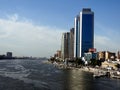 Cairo, Egypt, April 16 2023: The river Nile of Egypt with modern buildings and bridges along the Nile bank and the Egyptian walk Royalty Free Stock Photo