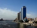 Cairo, Egypt, April 16 2023: The river Nile of Egypt with modern buildings and bridges along the Nile bank and the Egyptian walk Royalty Free Stock Photo