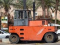 Wheeled Asphalt compactor paver truck, A paver (road paver finisher, asphalt finisher, road paving Royalty Free Stock Photo