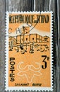 Old used postage stamp printed in Chad, shows Salamat and buffalo, circa 1961isolated on wooden background