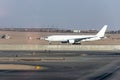 Cairo EGYPT - blank white Airplane standing to parking position at the international airport of Kairo