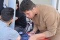 Cairo, Egypt, December 15 2022: Arterial blood pressure checking station for a blood donor before donation during a blood donation