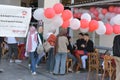 a blood donation campaign for children with thalassemia, with stations for registeration, checking donor blood pressure