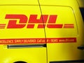 Cairo, Egypt, December 7 2022: DHL truck delivering a package, DHL is the global leader in the logistics industry specializing in