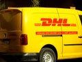 Cairo, Egypt, December 7 2022: DHL truck delivering a package, DHL is the global leader in the logistics industry specializing in