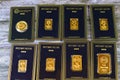 Cairo, Egypt, December 8 2023: 24K karat BTC Bullion Trading Center pure yellow gold of bars and sovereign coin, gold investment,