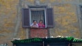 Two little girls at the window in Cairo