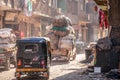 18/11/2018 Cairo, Egypt, inhabitants of garbage city in the streets of his area among a bunch of garbage