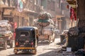 18/11/2018 Cairo, Egypt, inhabitants of garbage city in the streets of his area among a bunch of garbage