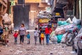 18/11/2018 Cairo, Egypt, inhabitants of garbage city in the streets of his area among a bunch of garbage