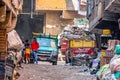 18/11/2018 Cairo, Egypt, inhabitants of garbage city in the streets of his area among a bunch of garbage