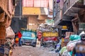 18/11/2018 Cairo, Egypt, inhabitants of garbage city in the streets of his area among a bunch of garbage Royalty Free Stock Photo