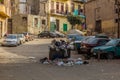 CAIRO, EGYPT - JANUARY 29, 2019: Street with a dumpster and stray animals in Cairo, Egy