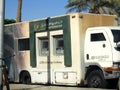 Cairo, Egypt, July 22 2023: A mobile banking vehicle, ATM and foreign exchange, of The Arab African International Bank, with 2 ATM