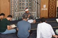 Cairo, Egypt, July 8 2022: A Noble Quran reading ring inside a mosque at the day of Arafah or Arafat before Eid Al-Adha, a group