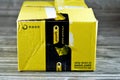 Cairo, Egypt, June 12 2023: Noon online shopping delivery yellow box package, Noon.com express for fast delivery and easy return,