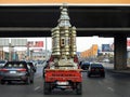 Cairo, Egypt, March 23 2023: A car transporting large Fanous lantern Islamic lamp of Ramadan to deliver it, Fanos Ramadan is a