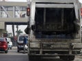 Cairo, Egypt, March 22 2023: a garbage large mobile car vehicle collecting garbage for trash removal from dustbins for