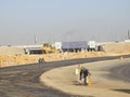 Cairo, Egypt, March 2 2024: process of paving a road and making asphalt emulsion in construction of new roads in Egypt real estate Royalty Free Stock Photo