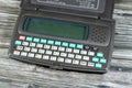 Cairo, Egypt, May 26 2023: Atlas dictionary translator device from English to Arabic and Arabic English with keyboard contains