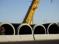 Cairo, Egypt, May 4 2023: A mobile crane ready for placing large 2500mm water pipe parts in place, sanitation pipes, improvement Royalty Free Stock Photo