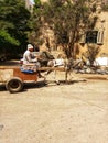 Cairo, Egypt - 17 September 2017: Arabian man rides a donkey on the street