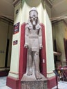 Cairo, Egypt - September 30, 2021: Statue of a pharaoh from the time of ancient Egypt in the Cairo National Museum. Vertical Royalty Free Stock Photo