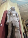Cairo, Egypt - September 30, 2021: Statue of a pharaoh from the time of ancient Egypt in the Cairo National Museum. Vertical Royalty Free Stock Photo