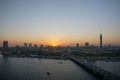 Cairo, Egypt: Cairo Tower and the Qasr el Nile Bridge at Sunset Royalty Free Stock Photo