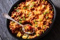 Cajun Beef Cornbread Casserole in baking dish