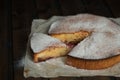 Cake with apples on a wooden background