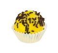 Cake ball with yellow glaze and chocolate sprinkles