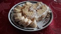 Cake with bannana on plate Royalty Free Stock Photo