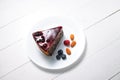 Cake with berry fruits, chia cereals and nuts isolated on white background Royalty Free Stock Photo