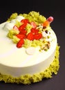 Cake with berry mousse in the mirror glaze .with strawberry and molecular biscuit decoration