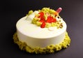 Cake with berry mousse in the mirror glaze .with strawberry and molecular biscuit decoration