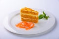 Cake with carrots plate on white background