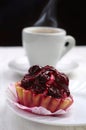 Cake with cherry and cup of coffee Royalty Free Stock Photo