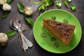 Cake with chocolate, honey and mint. Black background. Top view. Close-up