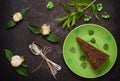 Cake with chocolate, honey and mint. Black background. Top view. Close-up