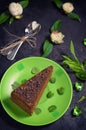 Cake with chocolate, honey and mint. Black background. Top view. Close-up