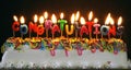 Cake with congratulations candles Royalty Free Stock Photo