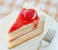 Cake with cream and jelly strawberries