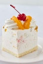 Cake dessert with peach and cherry Royalty Free Stock Photo