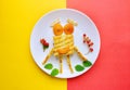 Cake with fruits in shape of frog. Creative idea for breakfast. Funny dish for Kids. Snack time. Lunch idea. Food art.